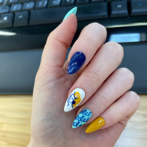 Image of CEO's nails with logo art